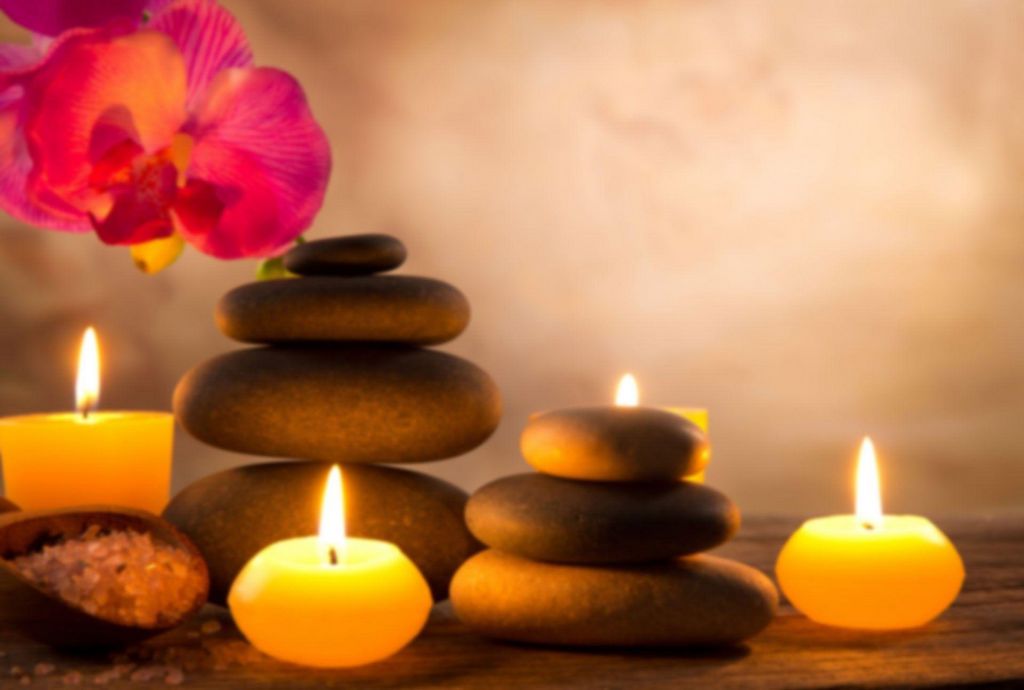 What Are the Wellness Benefits of a Hot Rock Massage Therapy?